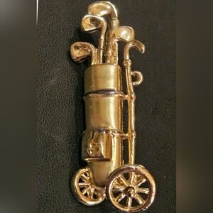Vtg. Goldtone Brooch Golf Bag On Wheels W/Golf Clubs, Wheel Rotates